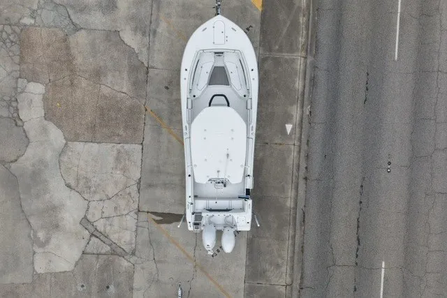 Slide: The Image of Aerial view of 2026 Tidewater 272 LXF boat on concrete surface. - 9