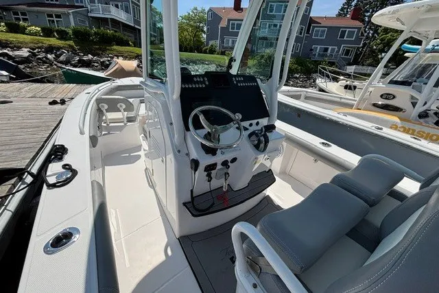 Slide: The Image of 2023 Everglades 253 Center Console boat interior with modern helm and seating. - 12