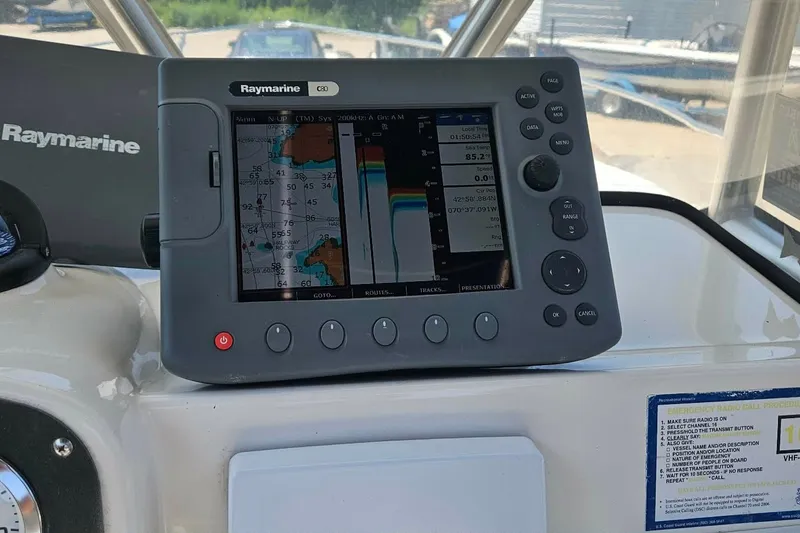 Slide: The Image of Raymarine GPS system on 2005 Sea Hunt Triton 232 boat dashboard. - 6