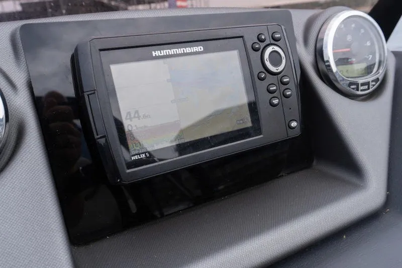 Slide: The Image of 2024 Sylvan L5 DLZ dashboard featuring a Humminbird Helix 5 fish finder and gauge. - 11