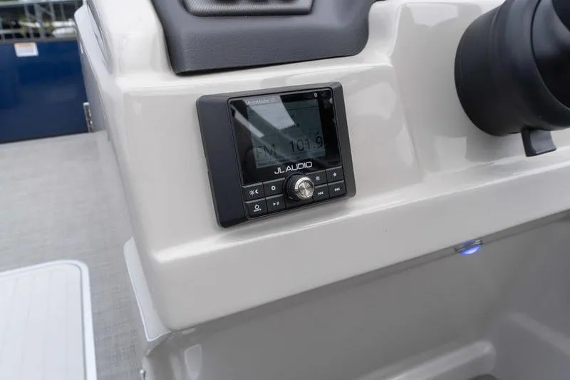 Slide: The Image of 2024 Sylvan L5 DLZ boat dashboard featuring JL Audio system. - 10