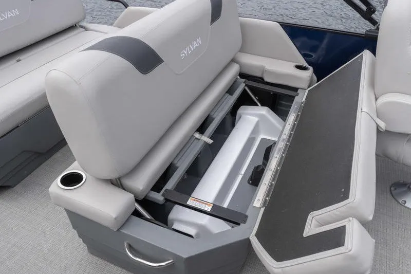Slide: The Image of 2024 Sylvan L5 DLZ boat seat storage compartment with cup holders and sleek design. - 25