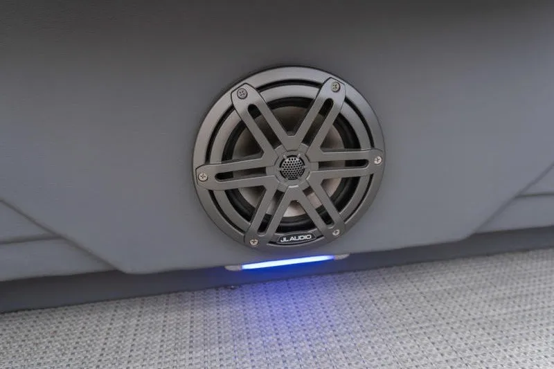 Slide: The Image of Speaker system in 2024 Sylvan L5 DLZ boat interior with blue LED lighting. - 18