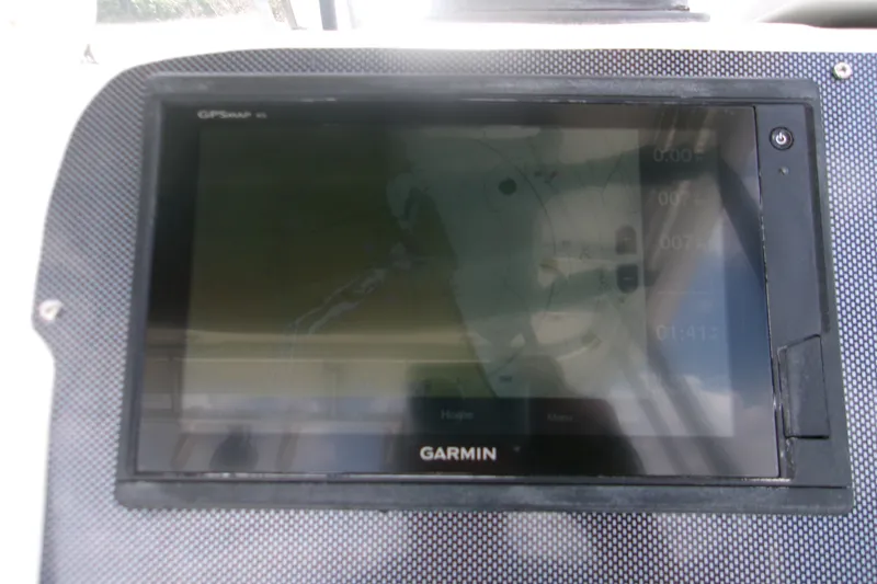 Slide: The Image of Garmin GPS display on 2007 Century 2400 Walk-Around boat dashboard. - 10