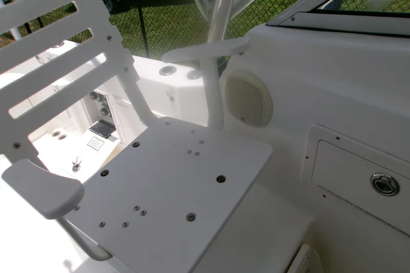 Slide: The Image of 2007 Century 2400 Walk-Around boat interior with seating and speaker detail. - 16