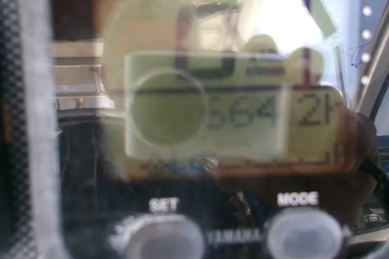 Slide: The Image of Close-up of a digital display on a 2007 Century 2400 Walk-Around boat. - 9