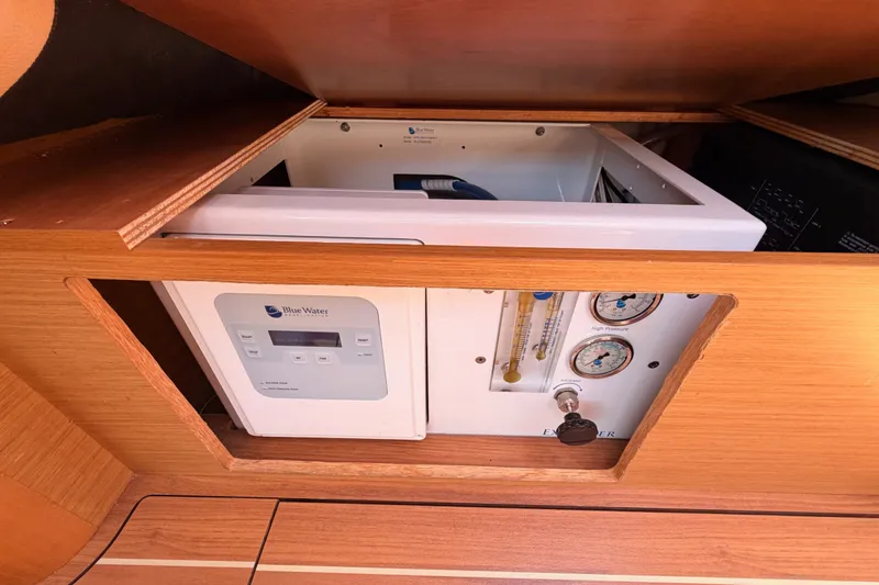 Slide: The Image of Watermaker system in 2009 Jeanneau Sun Odyssey 45 DS yacht interior. - 104