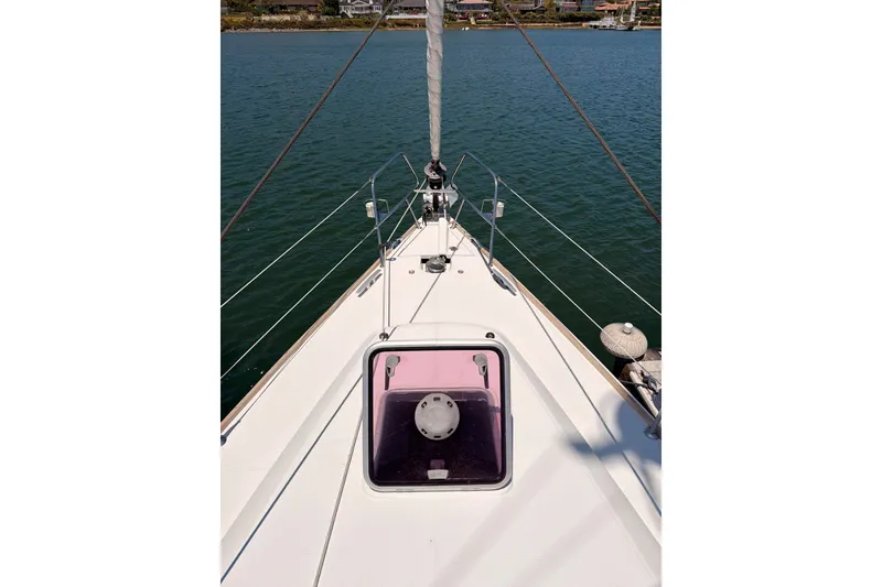 Slide: The Image of Bow view of 2009 Jeanneau Sun Odyssey 45 DS sailboat on calm water. - 29