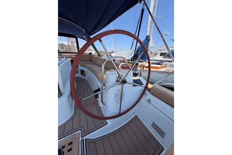 Slide: The Image of Steering wheel of 2009 Jeanneau Sun Odyssey 45 DS sailboat, docked in marina. - 14