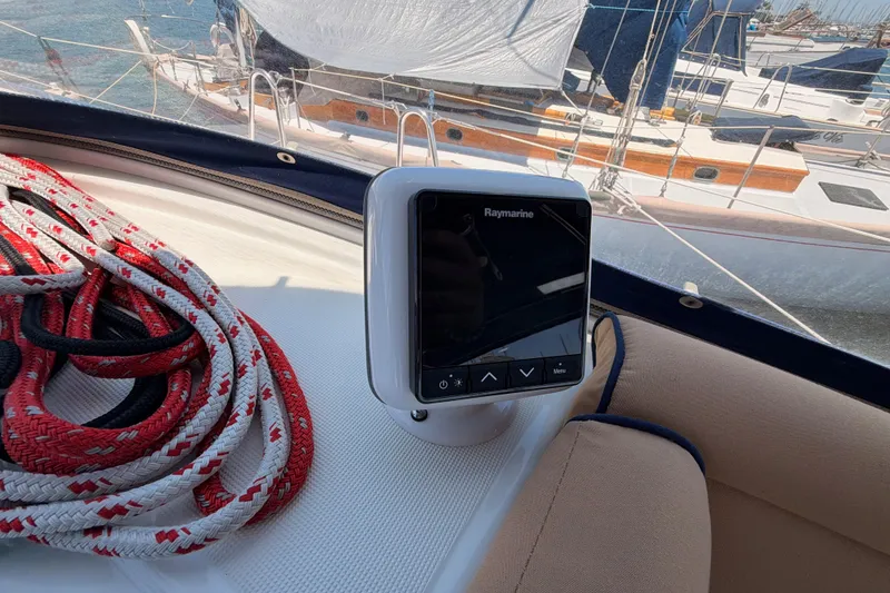 Slide: The Image of Raymarine navigation system on 2009 Jeanneau Sun Odyssey 45 DS sailboat with coiled ropes. - 41