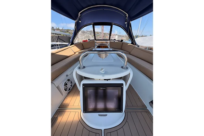 Slide: The Image of Cockpit of 2009 Jeanneau Sun Odyssey 45 DS sailboat with seating and navigation equipment. - 17