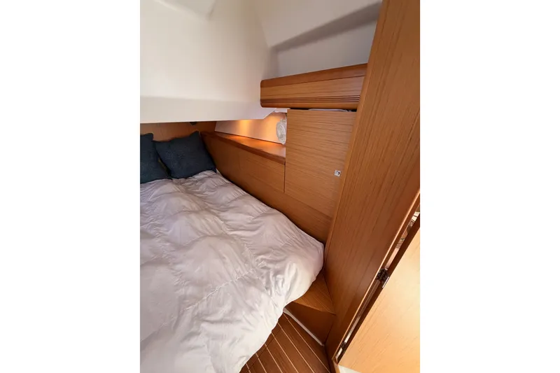 Slide: The Image of Cozy cabin interior of 2009 Jeanneau Sun Odyssey 45 DS sailboat with wooden finish. - 85