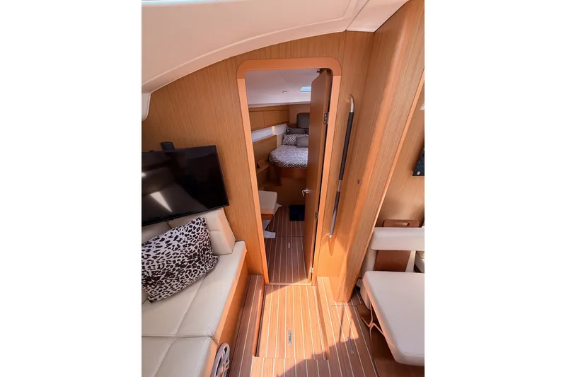 Slide: The Image of Interior of 2009 Jeanneau Sun Odyssey 45 DS yacht with cozy seating and modern decor. - 64