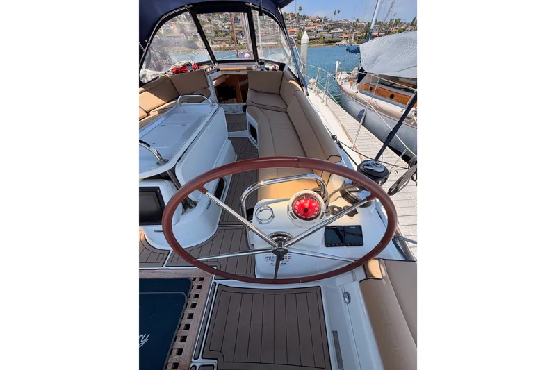 Slide: The Image of Cockpit of 2009 Jeanneau Sun Odyssey 45 DS sailboat with wooden steering wheel. - 16