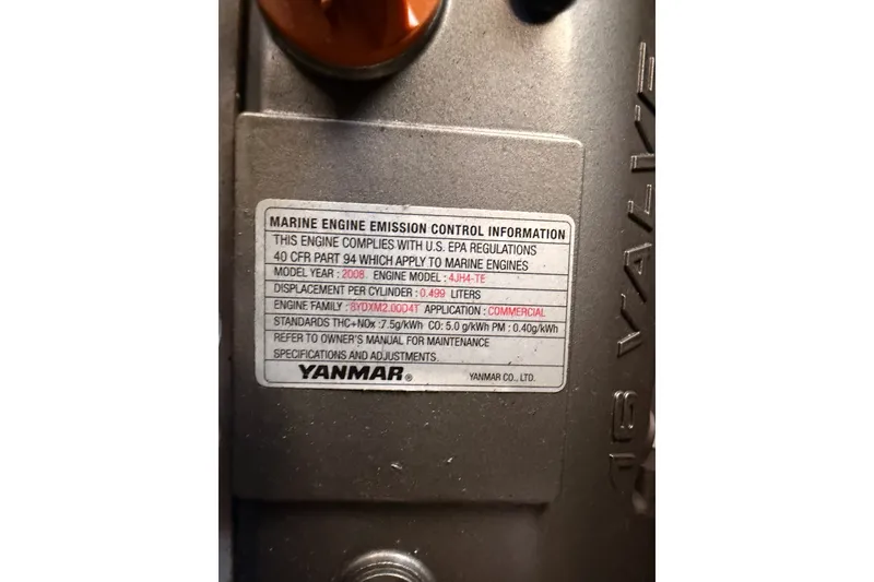Slide: The Image of Marine engine emission label on Yanmar engine, model 4JH4-TE, 2008, for Jeanneau Sun Odyssey 45 DS. - 97
