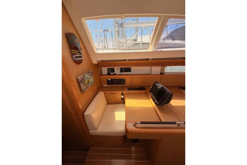 Slide: The Image of Interior of 2009 Jeanneau Sun Odyssey 45 DS yacht with seating and navigation equipment. - 46