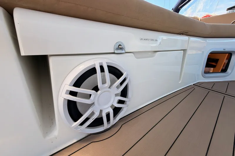 Slide: The Image of Speaker and storage compartment on 2009 Jeanneau Sun Odyssey 45 DS yacht deck. - 37