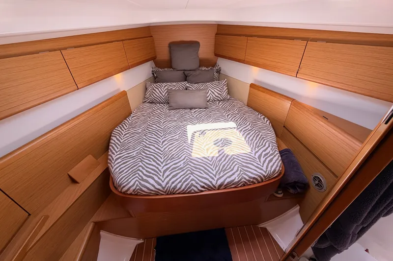 Slide: The Image of Luxurious cabin interior of 2009 Jeanneau Sun Odyssey 45 DS yacht with zebra-patterned bedding. - 66