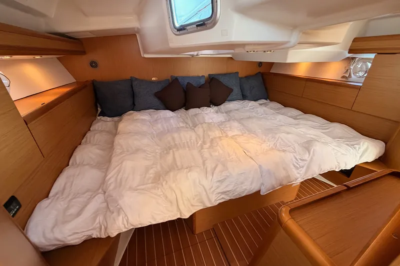 Slide: The Image of Luxurious cabin interior of 2009 Jeanneau Sun Odyssey 45 DS yacht with cozy bedding. - 89