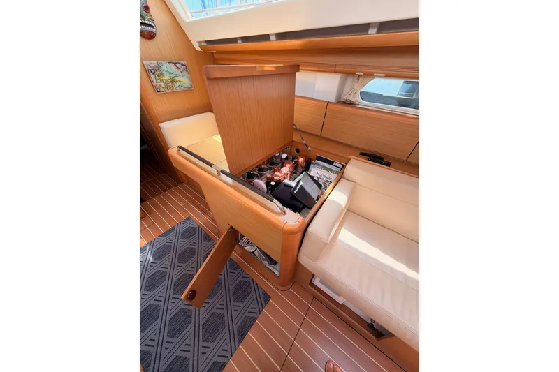 Slide: The Image of Interior of 2009 Jeanneau Sun Odyssey 45 DS yacht with storage compartment open. - 52