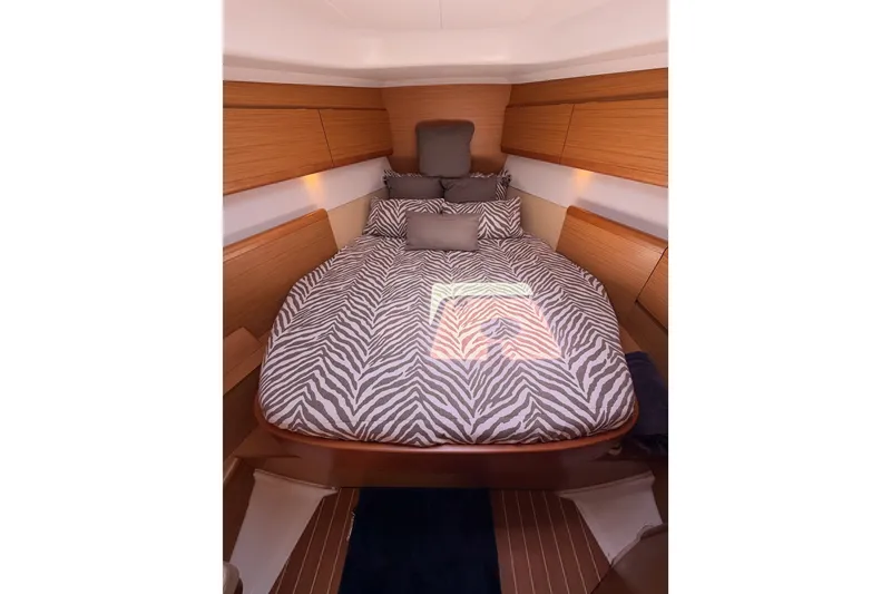 Slide: The Image of Luxurious cabin interior of 2009 Jeanneau Sun Odyssey 45 DS with zebra-patterned bedding. - 68