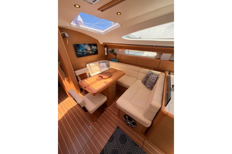 Slide: The Image of Luxurious interior of 2009 Jeanneau Sun Odyssey 45 DS yacht with elegant seating and wooden finishes. - 61