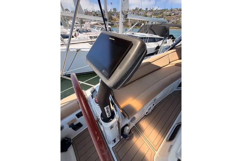 Slide: The Image of Cockpit view of 2009 Jeanneau Sun Odyssey 45 DS sailboat with navigation equipment. - 23
