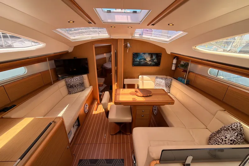 Slide: The Image of Luxurious interior of 2009 Jeanneau Sun Odyssey 45 DS yacht with elegant seating and skylights. - 60