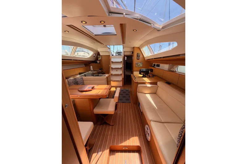 Slide: The Image of Luxurious interior of 2009 Jeanneau Sun Odyssey 45 DS sailboat with elegant wood finish. - 75