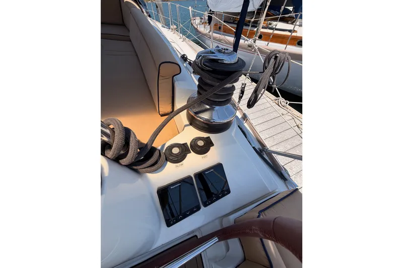 Slide: The Image of Cockpit view of 2009 Jeanneau Sun Odyssey 45 DS sailboat with winch and control panels. - 15