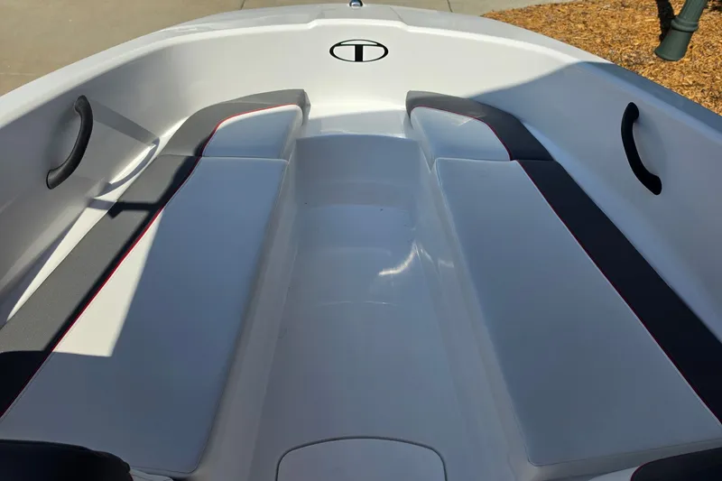 Slide: The Image of Interior view of a 2027 Tahoe T16 boat, featuring sleek seating and modern design. - 9