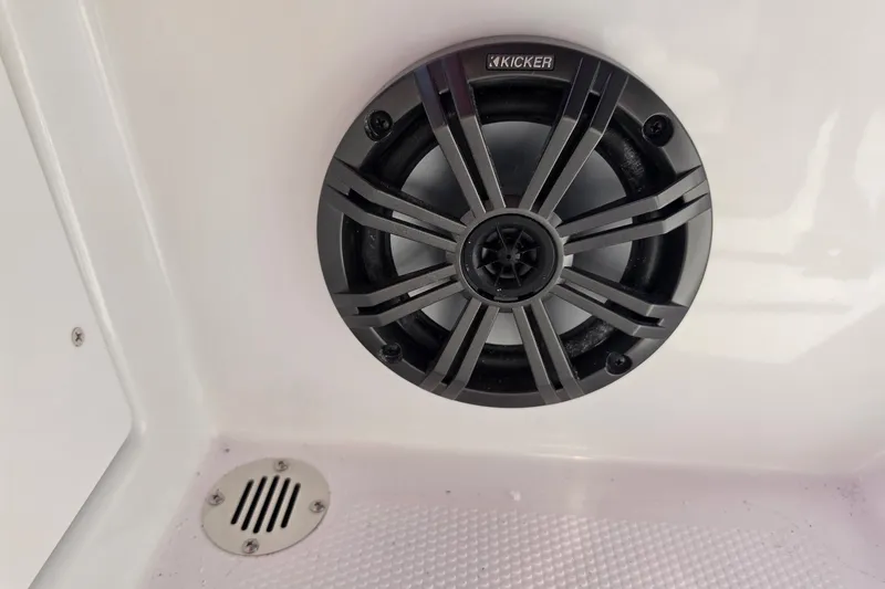 Slide: The Image of Kicker speaker installed in a 2027 Tahoe T16 boat interior. - 11