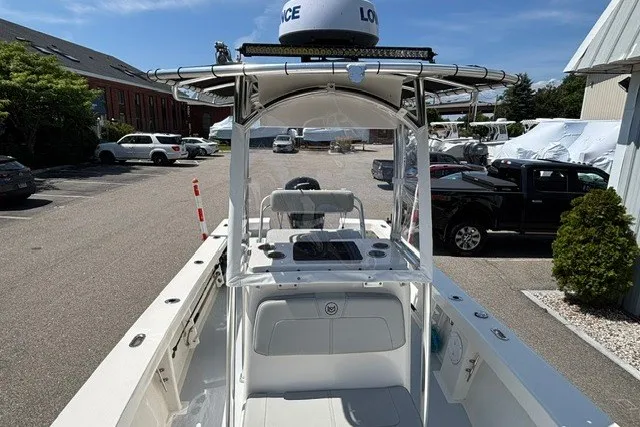 Slide: The Image of The image shows a 2023 May-Craft 20 Cape Classic boat. It features an open deck and central console. - 9