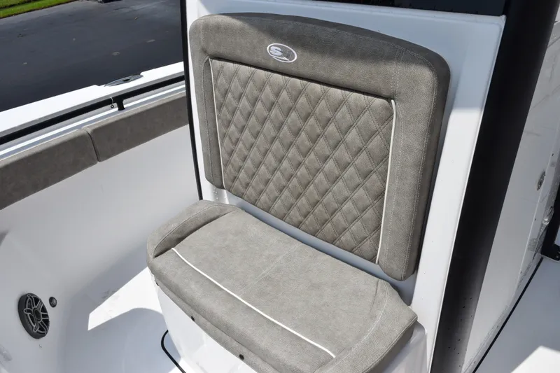 Slide: The Image of 2027 Sea Hunt Gamefish 25 boat seat with diamond-patterned upholstery. - 13