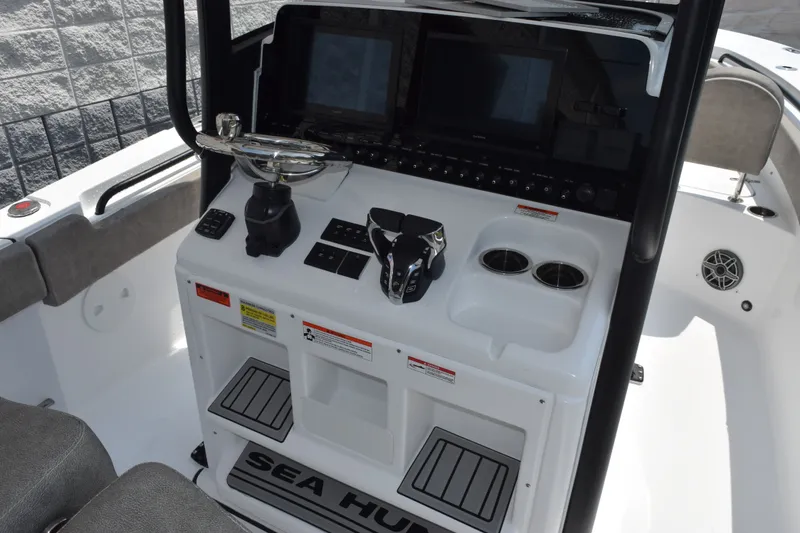 Slide: The Image of Helm of 2027 Sea Hunt Gamefish 25 with dual displays and controls. - 9