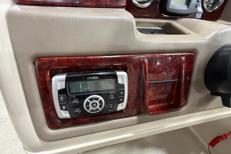 Slide: The Image of Dashboard of 2012 South Bay 522 SL with Clarion audio system. - 18