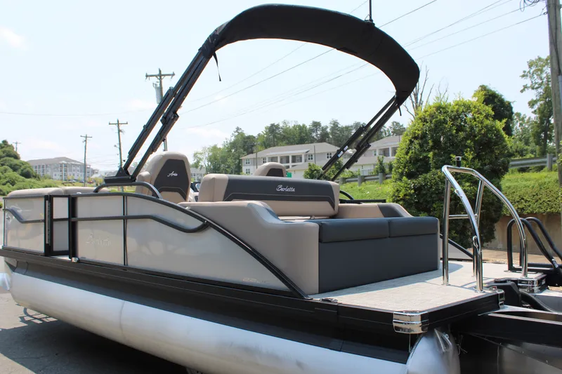 Slide: The Image of 2027 Barletta ARIA 22UC pontoon boat with sleek design and comfortable seating. - 5