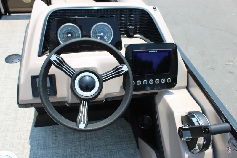 Slide: The Image of Steering console of 2027 Barletta ARIA 22UC with modern controls and display. - 12
