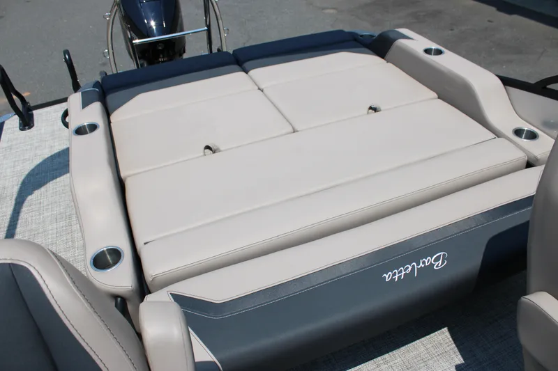 Slide: The Image of 2027 Barletta ARIA 22UC boat with spacious seating and cup holders. - 13