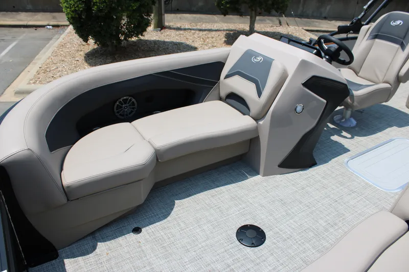 Slide: The Image of 2027 Barletta ARIA 22UC boat interior with beige seating and modern console design. - 11