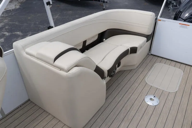 Slide: The Image of Luxurious seating on 2026 SunCatcher Fusion 324RC boat, featuring beige upholstery and sleek design. - 26