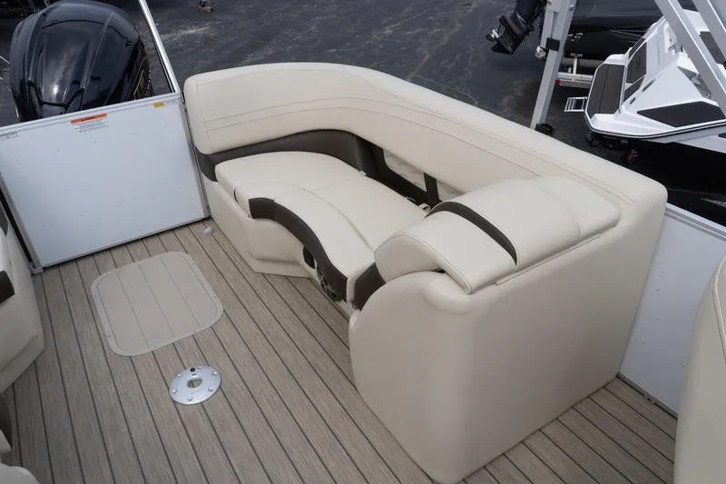 Slide: The Image of Luxurious seating on 2026 SunCatcher Fusion 324RC boat, featuring elegant beige upholstery. - 28