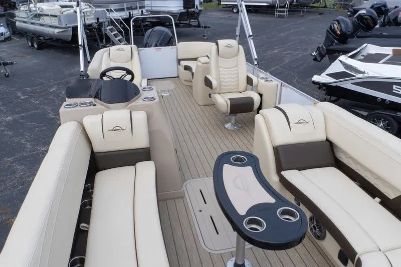 Slide: The Image of Luxurious 2026 SunCatcher Fusion 324RC pontoon boat with spacious seating and modern amenities. - 22