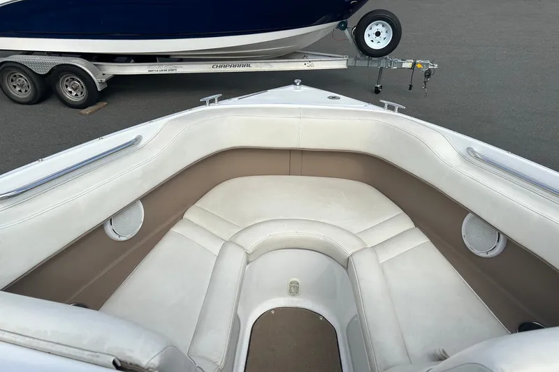 Slide: The Image of Interior of a 2008 Cobalt 200 boat with white and beige seating. - 19