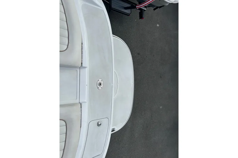 Slide: The Image of Rear view of a 2008 Cobalt 200 boat, featuring a clean white deck. - 14