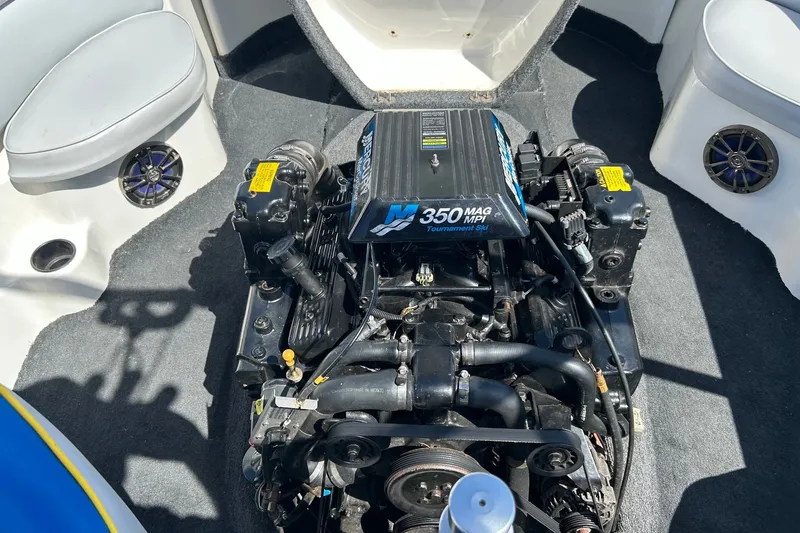 Slide: The Image of 2001 Tige 22i boat engine, featuring a 350 MAG MPI Tournament Ski motor. - 23