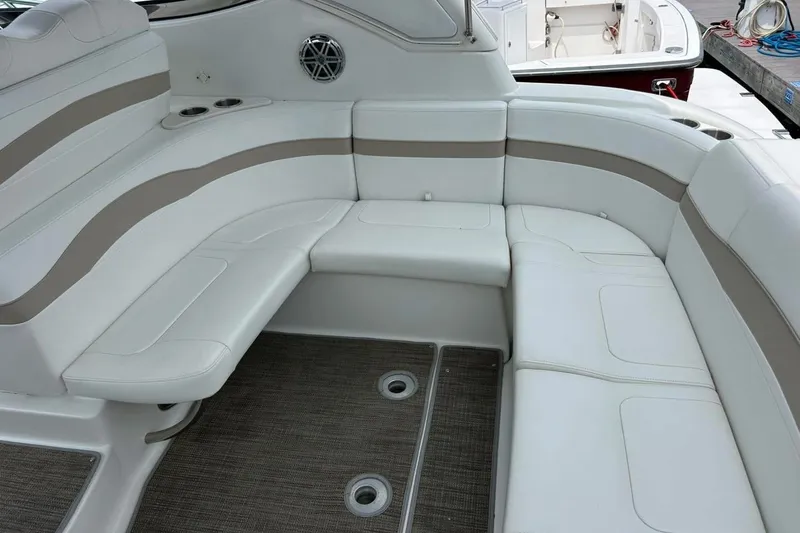 Slide: The Image of 2016 Formula 31 Performance Cruiser interior with white seating and beige accents. - 8