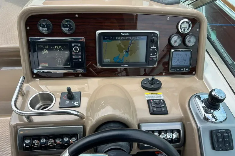 Slide: The Image of Control panel of a 2016 Formula 31 Performance Cruiser with navigation and instrumentation displays. - 7