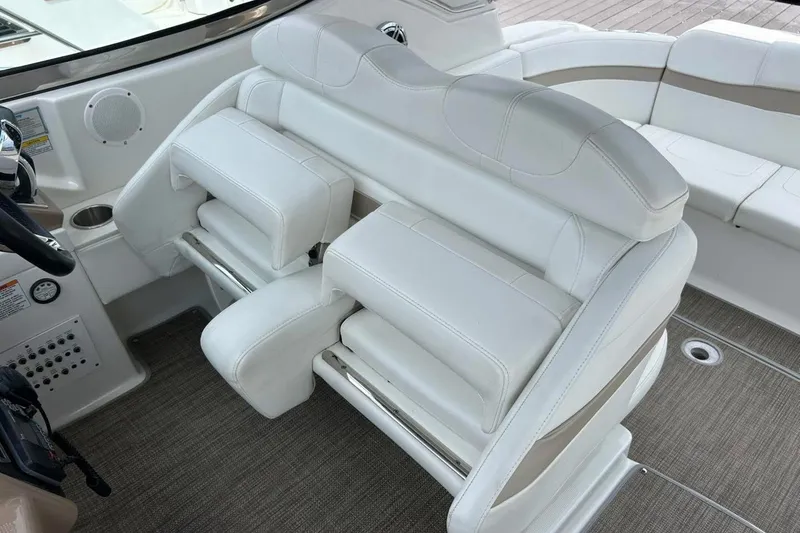 Slide: The Image of 2016 Formula 31 Performance Cruiser interior with white leather seating and modern design. - 13