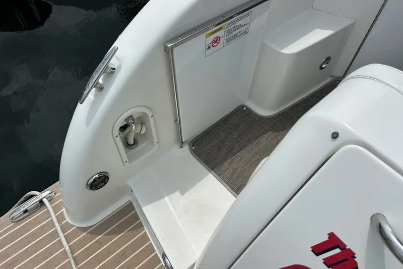 Slide: The Image of 2016 Formula 31 Performance Cruiser deck with step and railing detail. - 24